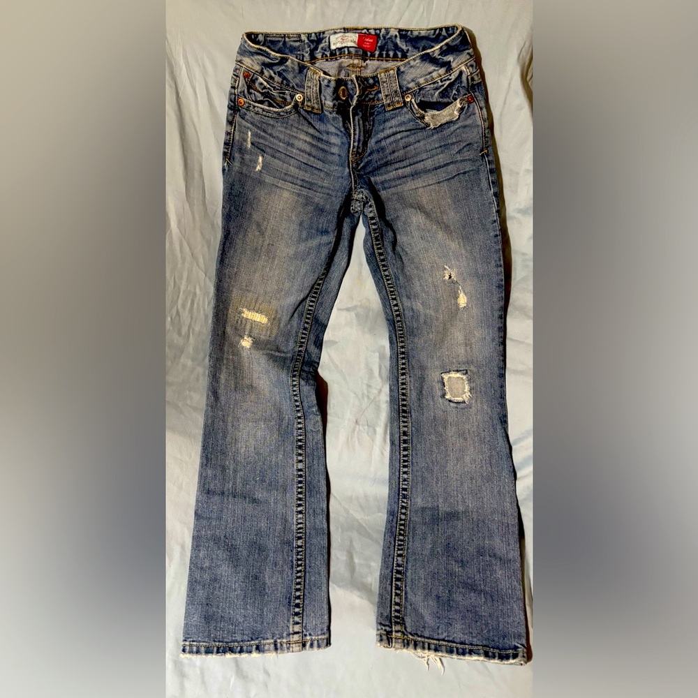 Distressed Blue Jeans